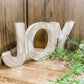 Whitewashed Joy Sign